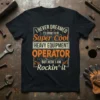 T-shirt design with text "I NEVER DREAMED I'D GROW TO BE Super Cool HEAVY EQUIPMENT OPERATOR BUT HERE I AM