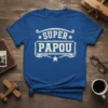 Blue t-shirt with white "Super Papou" text and decorative elements