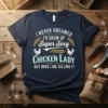 T-shirt with "I NEVER DREAMED I'D GROW UP Super Sexy CHICKEN LADY BUT HERE I AM, KILLING IT" text and