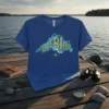 Blue t-shirt with "SUPERIOR" text in gold over a map of Lake Superior, featuring a compass rose graphic