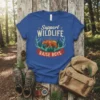 Support Wildlife Raise Boys t-shirt with a geometric bear, antlers, and forest graphic