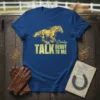 Blue t-shirt with "Talk Derby Derby To Me" text and a running horse graphic in gold