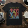 Black t-shirt featuring abstract colorful figures and the text "TALKING HEADS STOP MAKING SENSE"