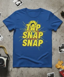 Blue t-shirt with yellow text "TAP SNAP SNAP" and a camera lens graphic, perfect for photographers