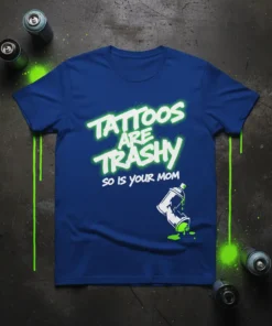 Blue t-shirt with neon green text reading "Tattoos ARE TRASHY SO IS YOUR MOM" and graphics of spray paint cans