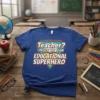 Teacher? I Prefer The Term Educational Superhero quote on a blue t-shirt, designed in a superhero emblem style