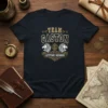 Team Gaston Lifetime Member t-shirt with vintage gold and black typography, featuring lion crests and decorative elements