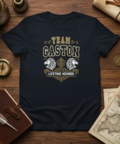 Team Gaston Lifetime Member t-shirt with vintage gold and black typography, featuring lion crests and decorative elements