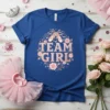 Team Girl text with ballet shoes and floral border on a royal blue t-shirt