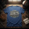 Team Jarrett Lifetime Member text with wings graphic on a blue t-shirt