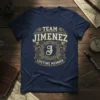 Team Jimenez Lifetime Member text design on a navy blue t-shirt, featuring ornate gold accents and a central 'J' emblem