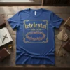 Blue T-Shirt with "Tetelestai John 19:30" text and crown of thorns graphic in gold, Christian apparel design