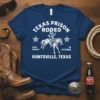 T-shirt design featuring "TEXAS PRISON RODEO EVERY SUNDAY IN OCTOBER HUNTSVILLE, TEXAS" text with cowboy on a horse graphic