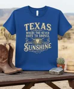 Texas Where You Never Have To Shovel Sunshine quote on a blue t-shirt with a steer skull graphic