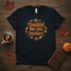Thankful For you Fuckers text design with autumn leaves wreath on a black t-shirt
