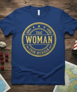 That Woman From Michigan text graphic in a distressed circular emblem on a blue t-shirt