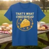 Blue t-shirt with "That's What Cheesehead" text and a cartoon slice of Swiss cheese graphic