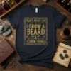 T-shirt with gold text "THAT'S WHAT I DO I GROW A BEARD & I KNOW THINGS" in a decorative border
