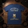 T-shirt with "That's What I Do I Play Guitar And I Know Things" text and a decorative guitar graphic