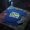 Blue t-shirt with bold yellow text "THAT'S A CLOWN QUESTION, BRO." in a digital graphic style