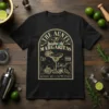 The Aunts Midnight Margaritas retro design with cocktail glass, limes, and vintage text on a black t-shirt