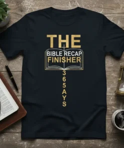 The Bible Recap Finisher 365 Days text design on a black t-shirt, featuring an open book graphic and gold lettering