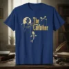 The Catfather t-shirt design featuring a cat in a suit holding fish skeletons on strings, with golden text
