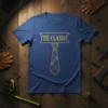 Blue t-shirt with gold glitter text "THE CLASSIC" above a gold geometric tie design