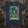 The Cosmic Tripper 420 t-shirt design featuring a green alien wearing a bucket hat and smoking, with mushrooms and cosmic