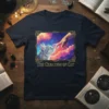 The Creation of Cat T-Shirt featuring a cat reaching for a hand amidst a vibrant celestial sky, framed by an