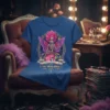 The Drag Queen Lone Line t-shirt design featuring a skeleton drag queen with wings and a pink dress, set within