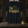 The Frogfather t-shirt design featuring a dapper frog smoking a cigar, with ornate golden text