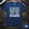 T-shirt with text "THE FUTURE'S SO BRIGHT I GOTTA WEAR SHADES" above a graphic of stylized sunglasses