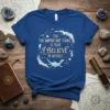 Blue t-shirt with the quote "The Important Thing Is That I Believe In Myself" in gold and white, surrounded by