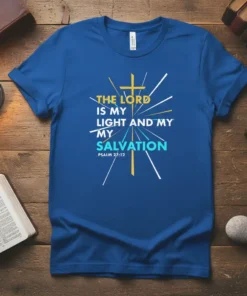 Blue t-shirt with "The Lord Is My Light and My Salvation Psalm 27:12" text and a golden cross graphic