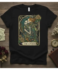 The Lovers tarot card design featuring kissing skeleton couple surrounded by roses, printed on a black t-shirt
