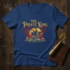 The Pirate King t-shirt design with a vintage pirate ship, kraken tentacles, compass, and ocean waves