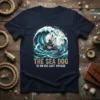The Sea Dog Is On His Last Voyage quote with a boat in a wave graphic on a navy t-shirt