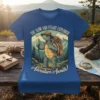 The Slow and Steady Explorer Adventure Awaits t-shirt design featuring a cartoon turtle hiker with a backpack and walking stick