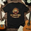 Black t-shirt with "The Sound of Music Is The Music Of Sound" text and a roaring lion graphic, perfect for