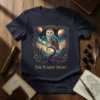 The Starry Night t-shirt design with a barn owl, celestial sky, planets, and ornate border
