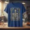 The Stylist T-Shirt featuring a skeleton hairdresser holding scissors and a hairdryer, adorned with floral accents