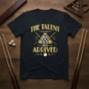 Black t-shirt with gold text "THE TALENT HAS ARRIVED" above a triangle of pool balls and crossed cues