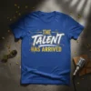 The Talent Has Arrived text design on a royal blue t-shirt, featuring bold gold and white lettering with graphic accents