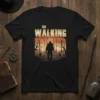 The Walking Dad T-Shirt design featuring silhouette of a man with a backpack walking in a desolate landscape with bare