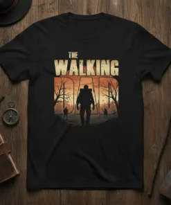The Walking Dad T-Shirt design featuring silhouette of a man with a backpack walking in a desolate landscape with bare