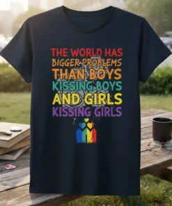 T-shirt with the quote "The World Has Bigger Problems Than Boys Kissing Boys And Girls Kissing Girls" in rainbow colors