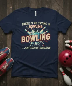 Navy blue t-shirt with retro design saying "THERE IS NO CRYING IN BOWLING BOWLING ... JUST LOTS OF SWEARING"