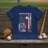 Theres No Crying In Baseball text with distressed American flag graphic on a navy blue t-shirt