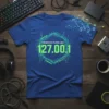 T-shirt with "There's No Place Like 127.00.1" in neon green text, featuring a hexagonal network design